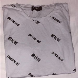 White shirt thats say paranoid a lot
